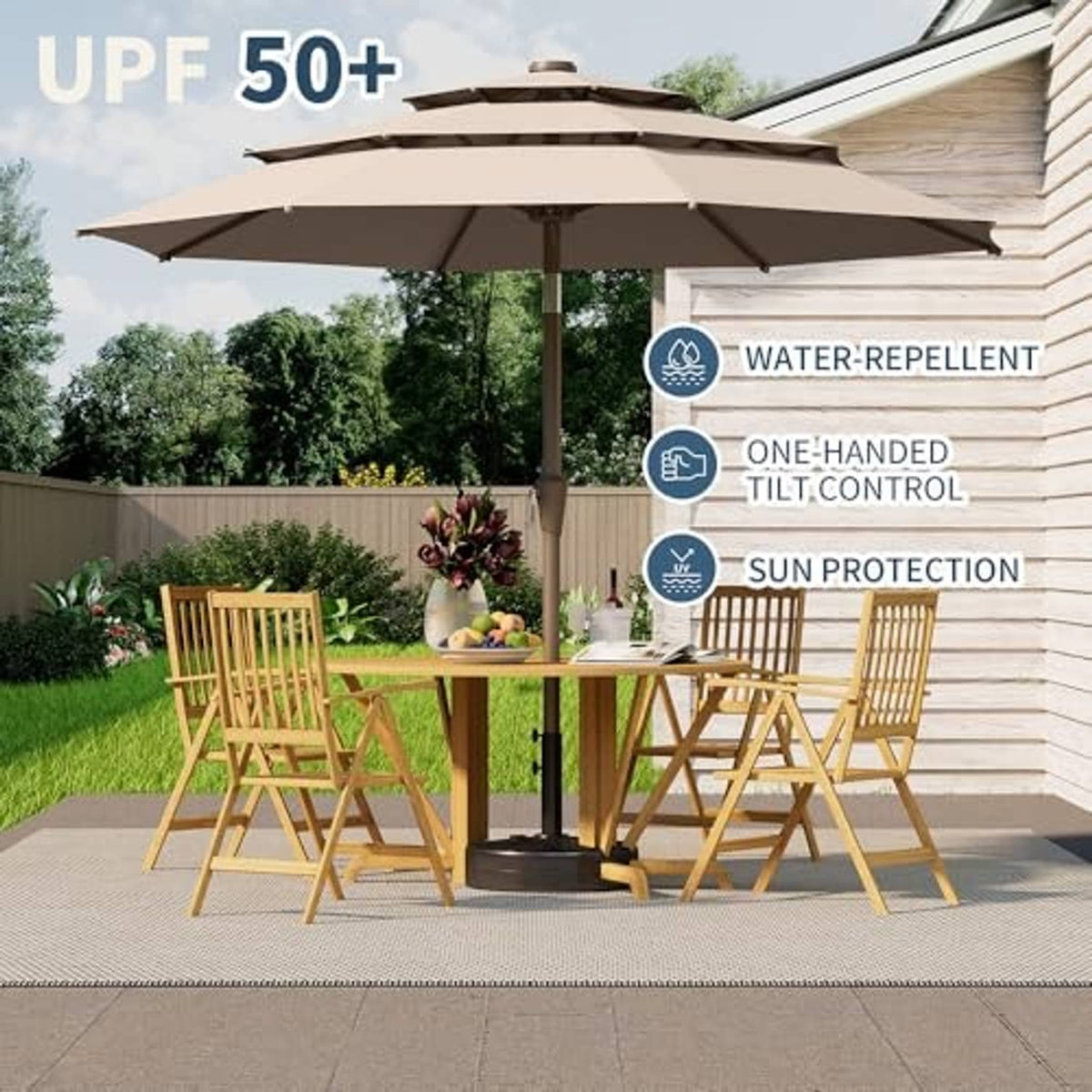 Beige 3-tier patio umbrella with black pole, open canopy on outdoor patio