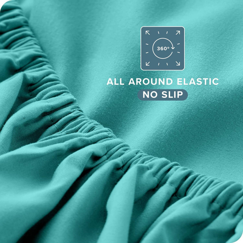 Turquoise sheet corner with gathered elastic for a snug, no-slip fit