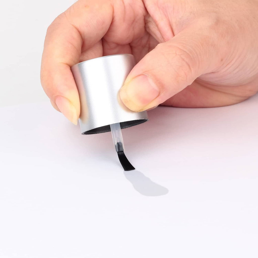 Adhesion promoter tape primer with silver cap dispensing clear primer strip.