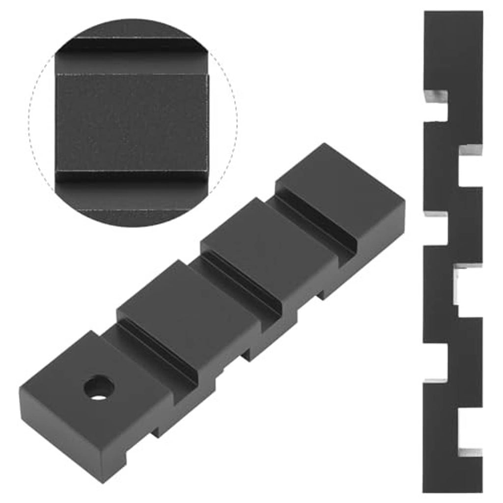 Chainsaw chain breaker tool: black connector block with a pin hole and slots