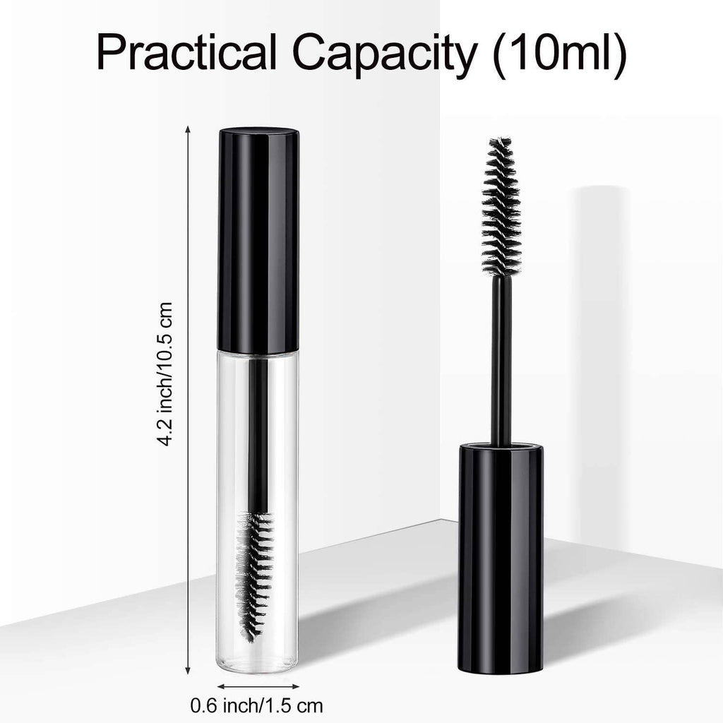 Empty mascara tube with clear body and black wand brush, two cap styles