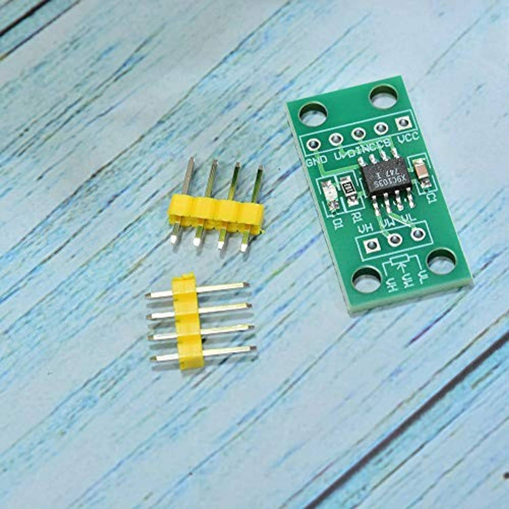 Green PCB digital potentiometer module with separate yellow pin headers