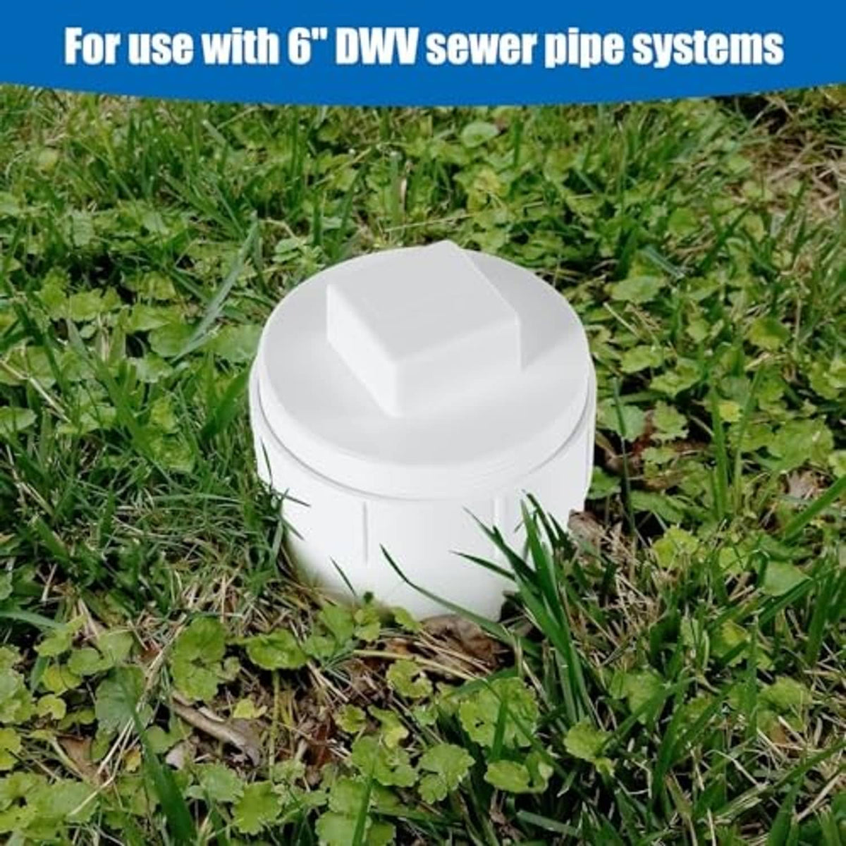 White PVC sewer cleanout adapter with plug cap, outdoor ground positioning