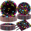 Neon splatter glow party plate and napkin set with stacked plates and plastic forks