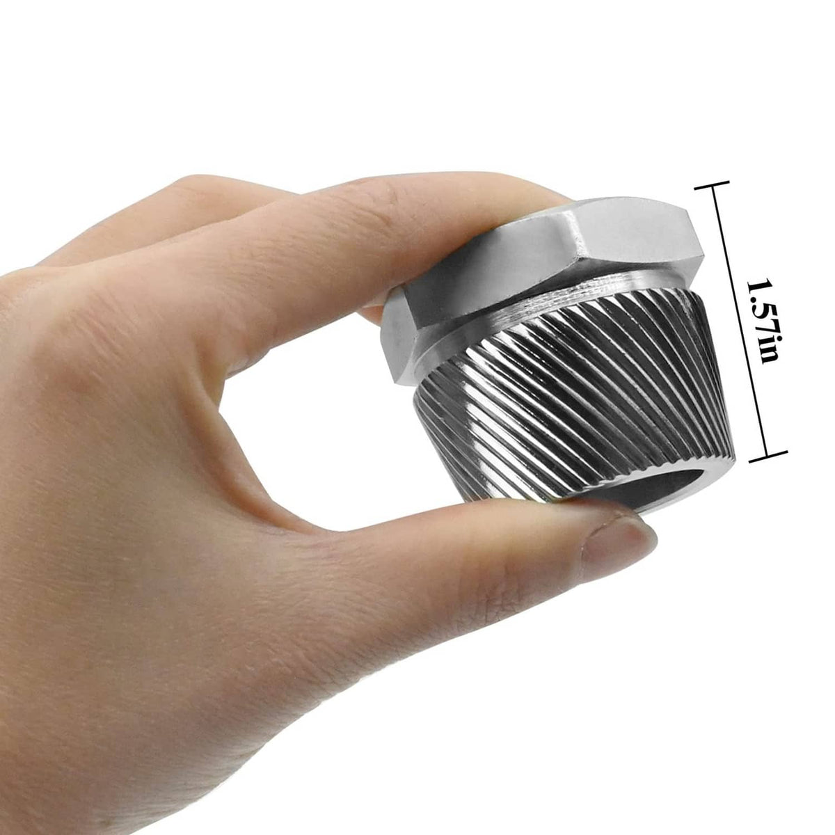 Chrome ridged hex drain extractor held in hand, showing star-shaped center drive