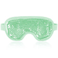 Green cooling gel eye mask with flexible strap, contoured for under-eye relief