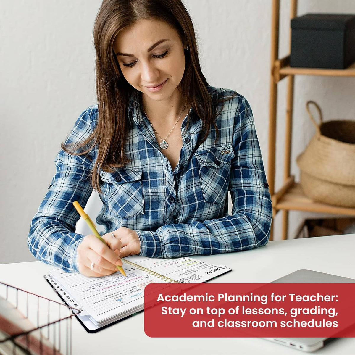Teacher writing in a floral planner for lessons, grading, and classroom schedules