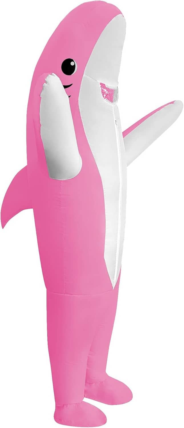 Pink inflatable shark costume with white belly, dorsal fin, and flipper arms, full-body