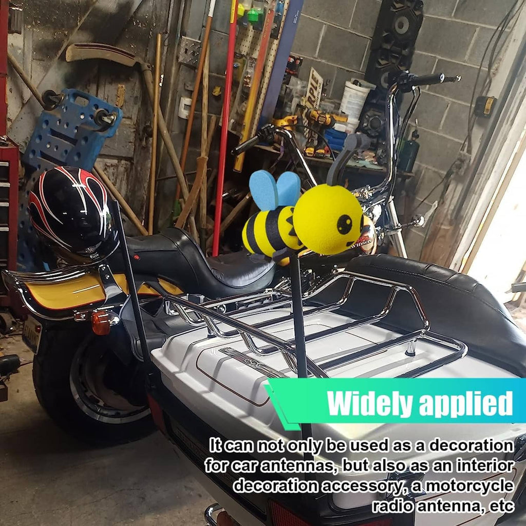 Foam bee car antenna topper with yellow body, black stripes, and blue wings
