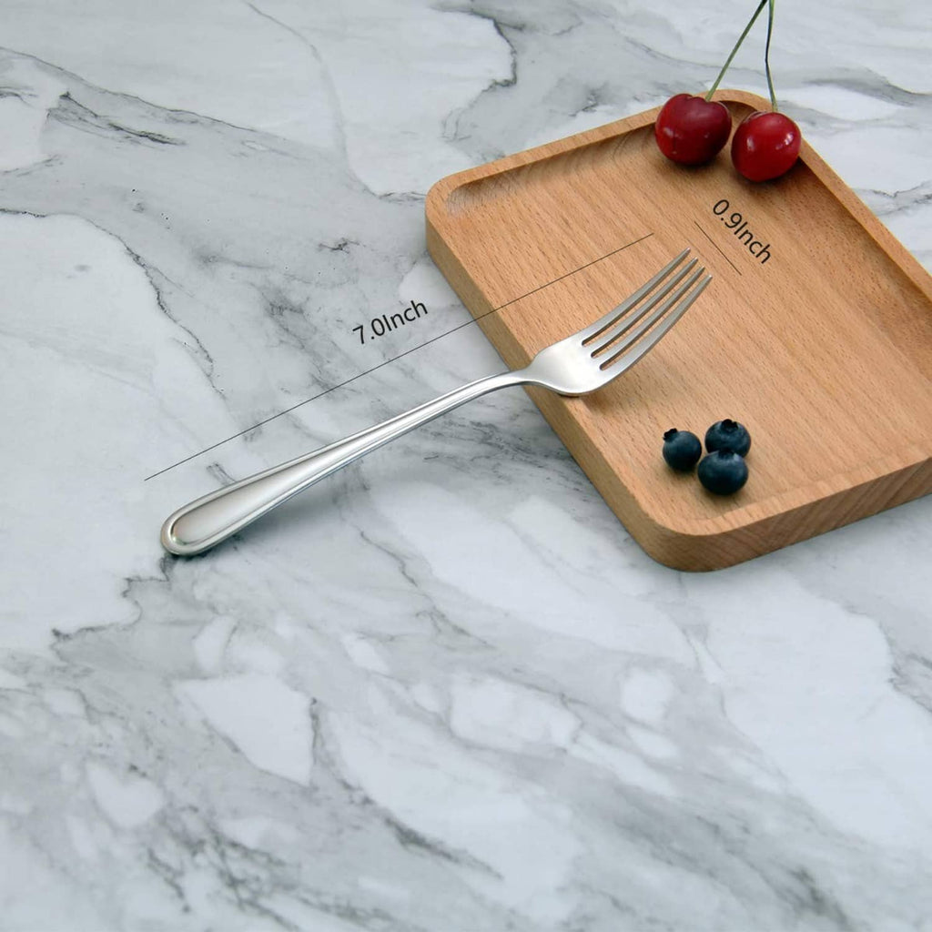 7-inch stainless salad fork on a wooden serving board, 3-tine flatware