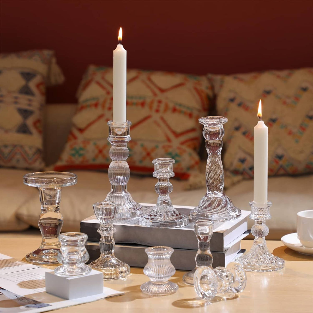 Clear glass taper candle holders with tall and short ribbed designs and candles