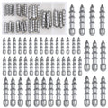 Assorted grey nail sinker weights with pointed ends, multiple pieces laid out.