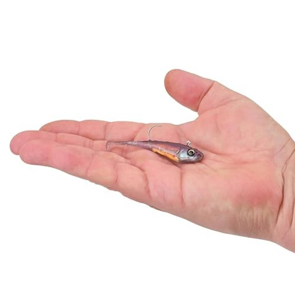 Purple-blue soft plastic fishing bait held in a hand with exposed hook