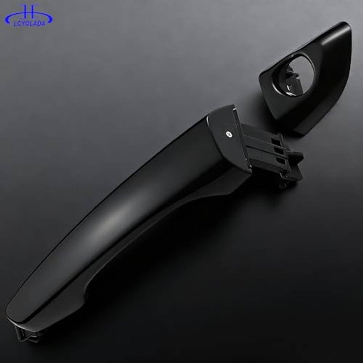 Front left exterior door handle with keyhole bezel and visible mounting tabs