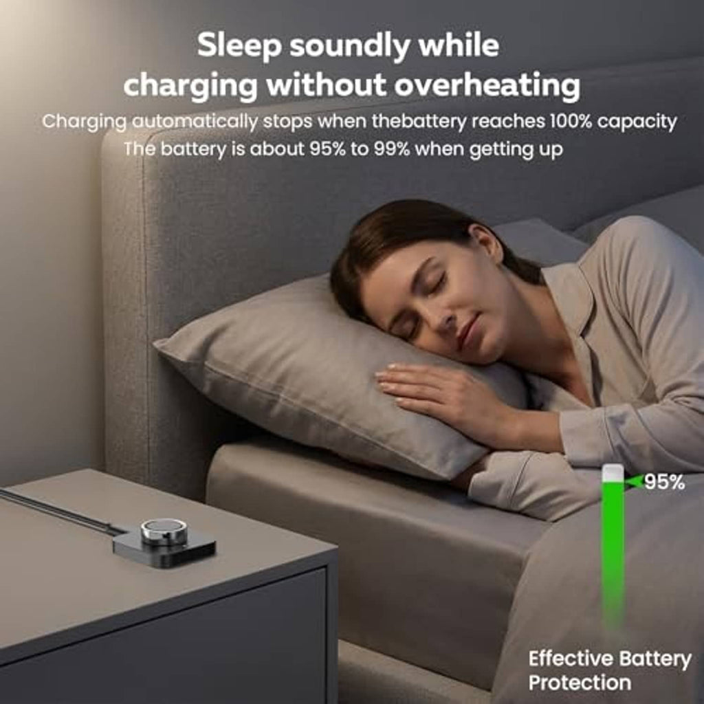Black ring charging dock on bedside table, with ring cradle and charging indicator glow.
