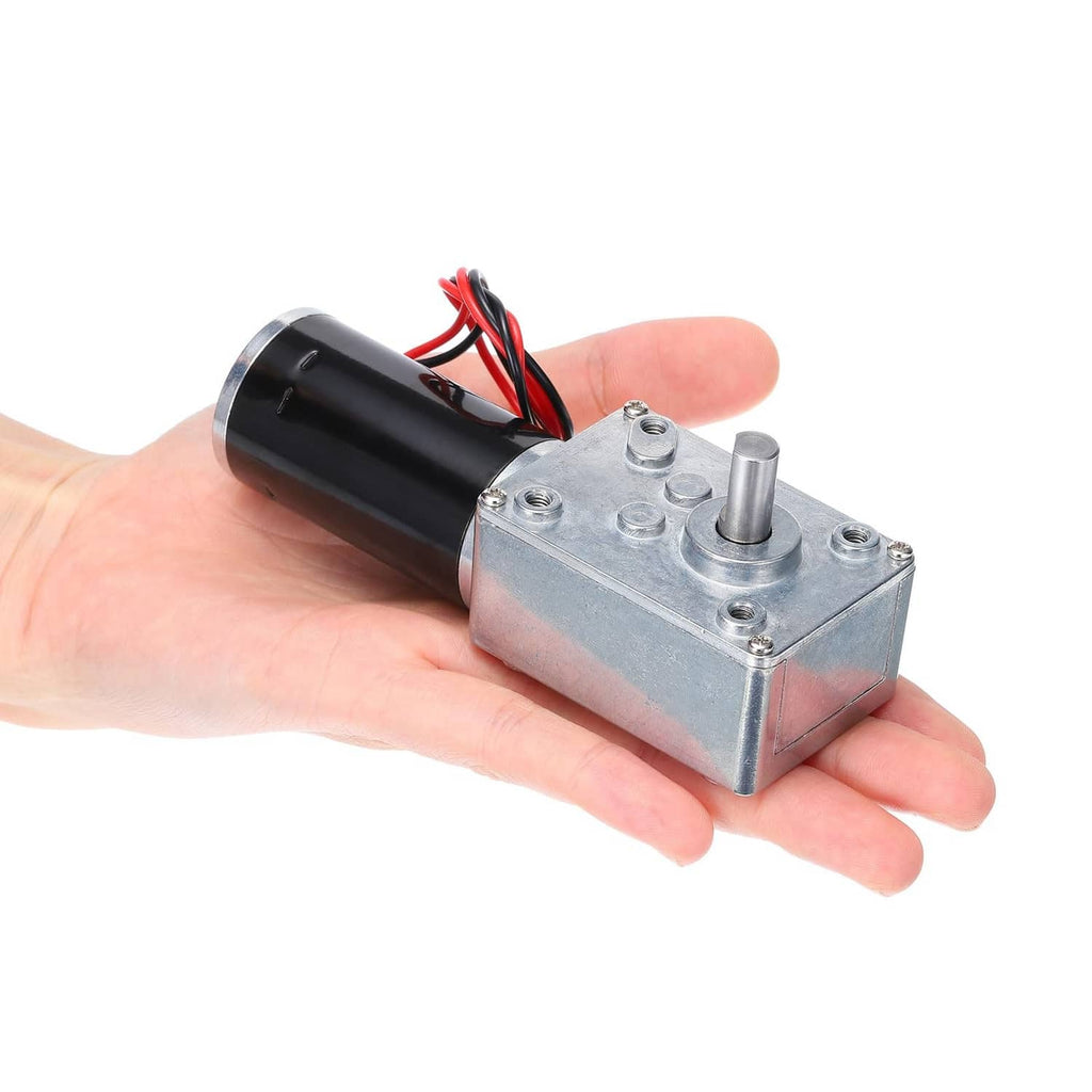 DC geared worm motor held in hand, showing silver gearbox, black cylinder, and wires