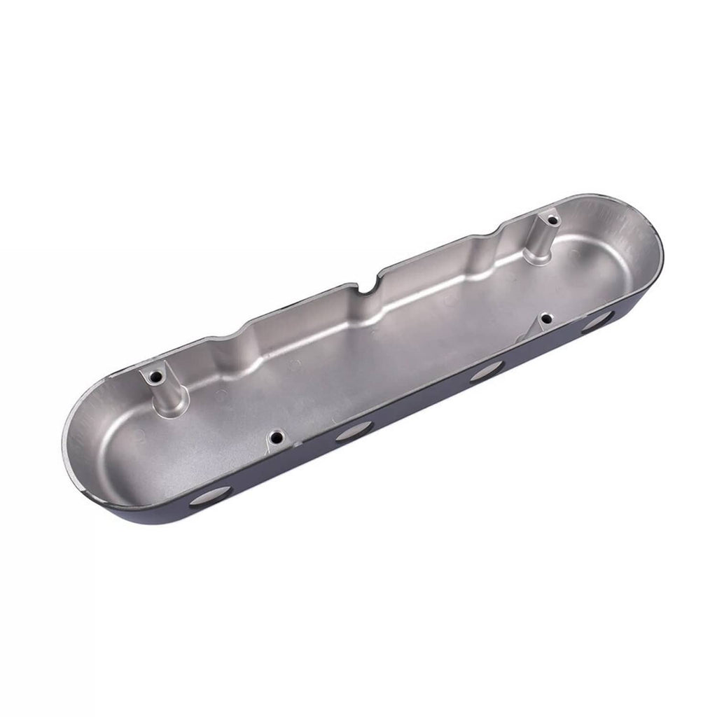Raw aluminum valve cover with mounting tabs and bolt holes