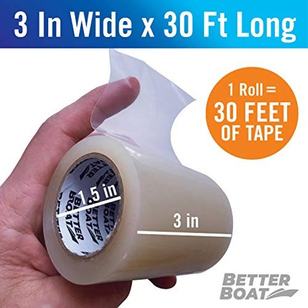 Hand holding clear repair tape roll; shows 3 in width and 30 ft length markings.