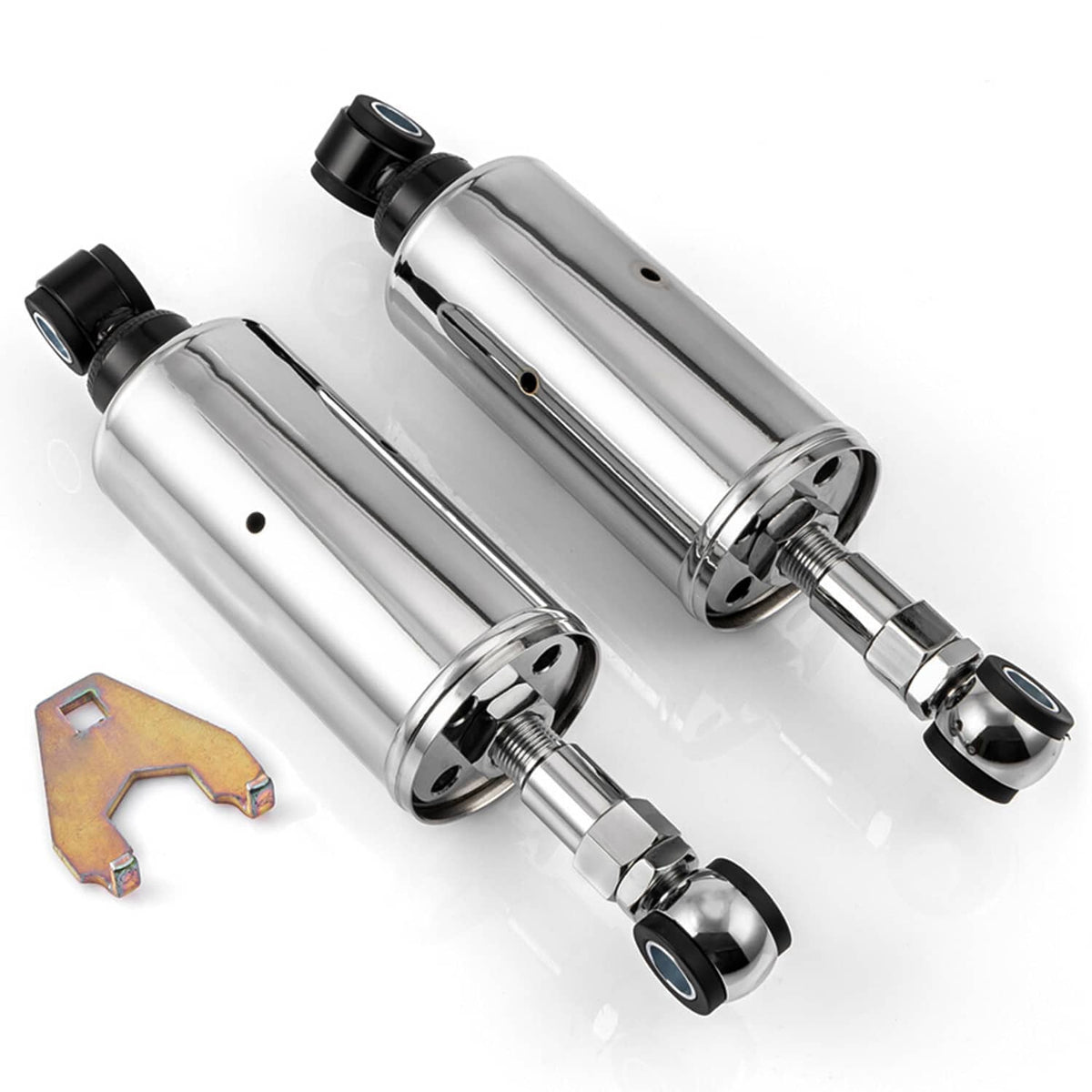 Pair of chrome rear shock absorbers with black end caps and chrome mounting hardware