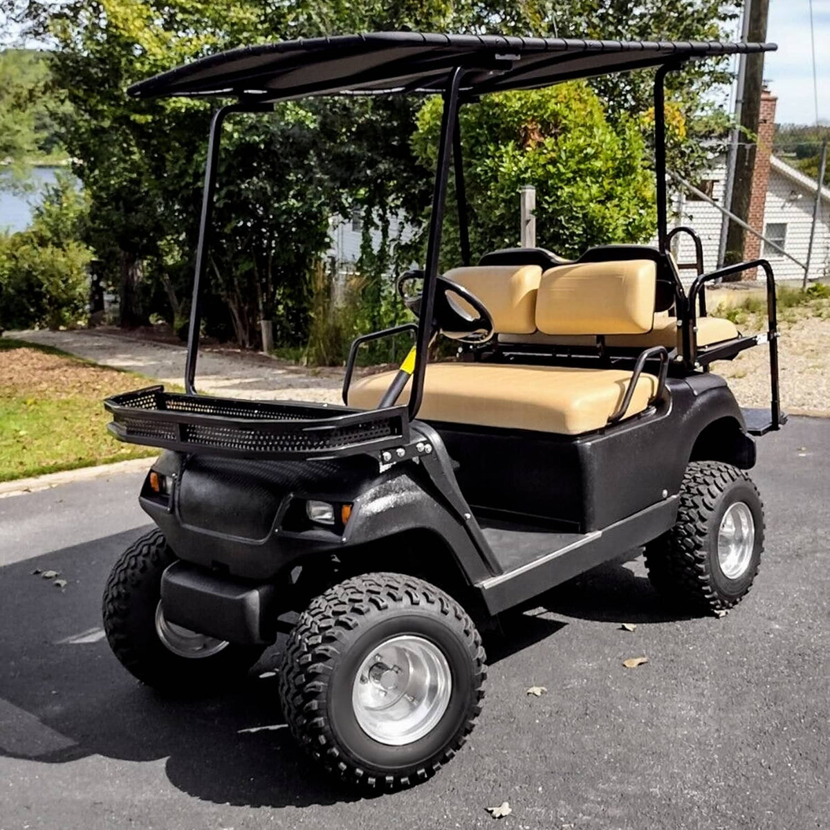 Golf cart with installed black perforated front basket and mounting brackets