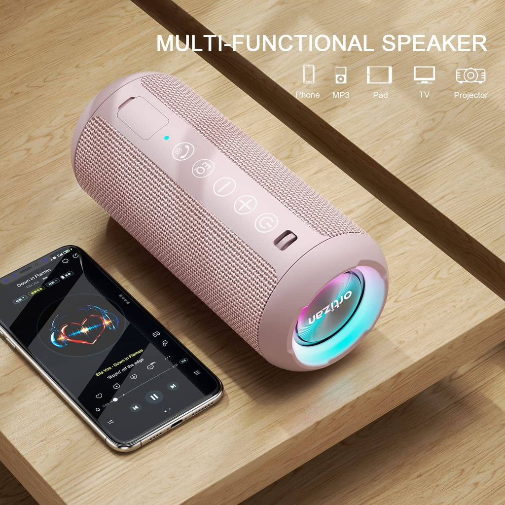 Pink portable Bluetooth speaker with LED ring lights and button controls on top