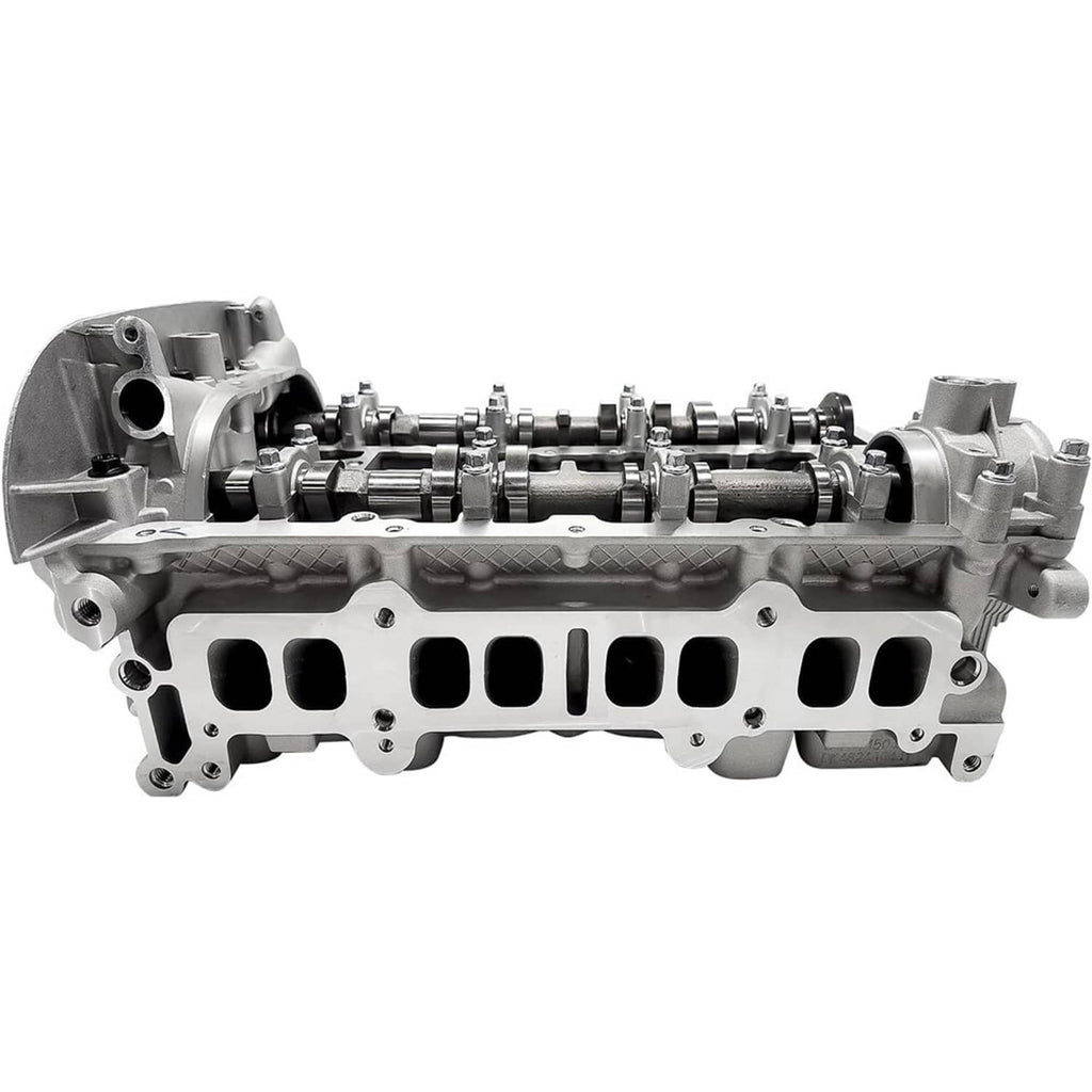 Engine cylinder head assembly side view with valve ports and camshaft components, silver