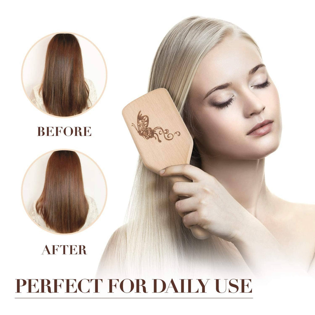 Boar bristle hair brush with natural wood handle and black bristles