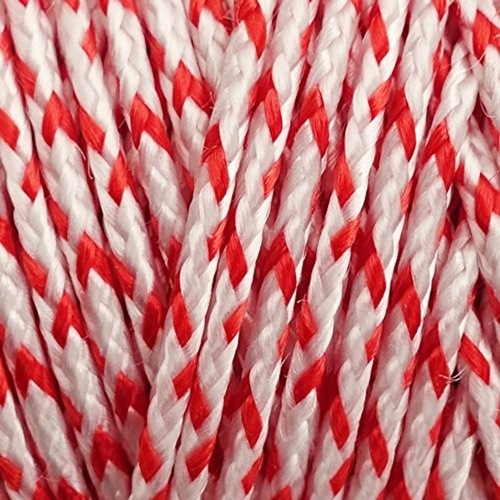 Close-up of red and white braided Dacron kite line rope texture.