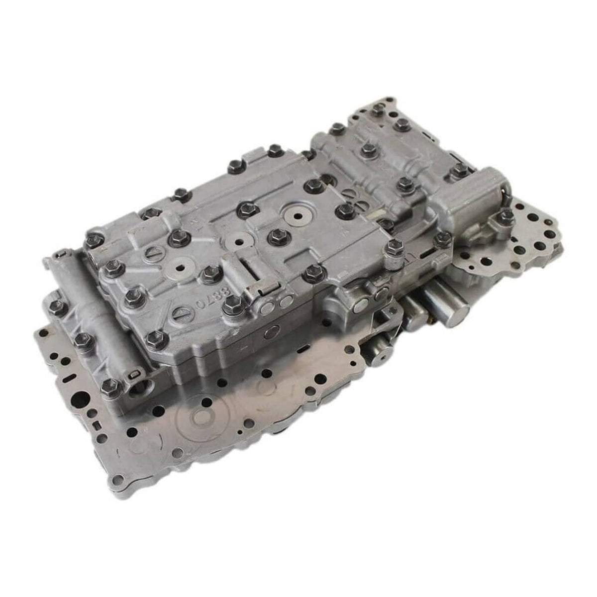 Transmission valve body with solenoids, angled view of silver-gray metal housing