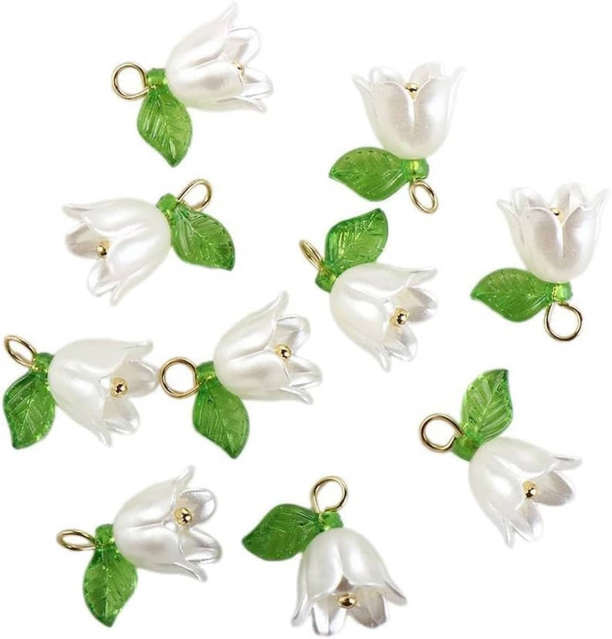 Set of white bell orchid flower beads with green leaves and gold loop rings, assorted