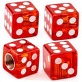 Four red dice-shaped tire valve stem caps with white dot faces and threaded openings
