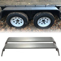 Steel diamond tread tandem trailer fenders with curved ends, mounted under a trailer