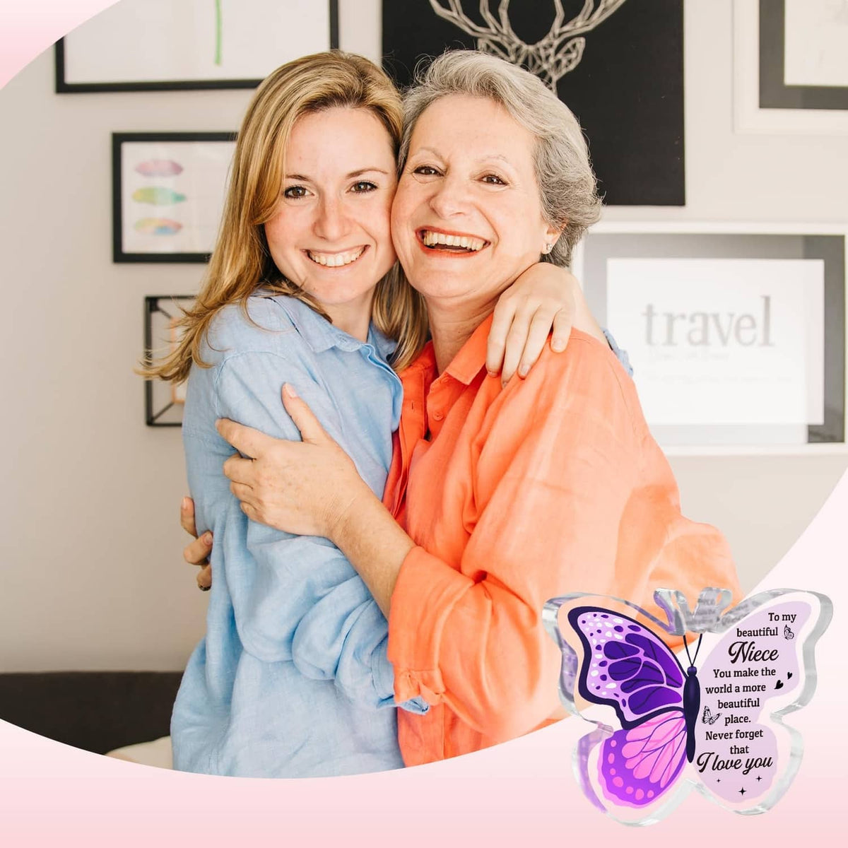 Purple butterfly-shaped message card with clear ribbon held by two women