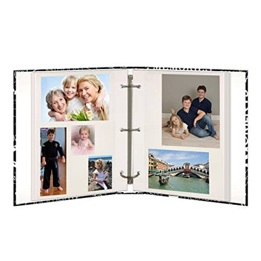Open photo album with three metal rings and multiple printed family photos inside