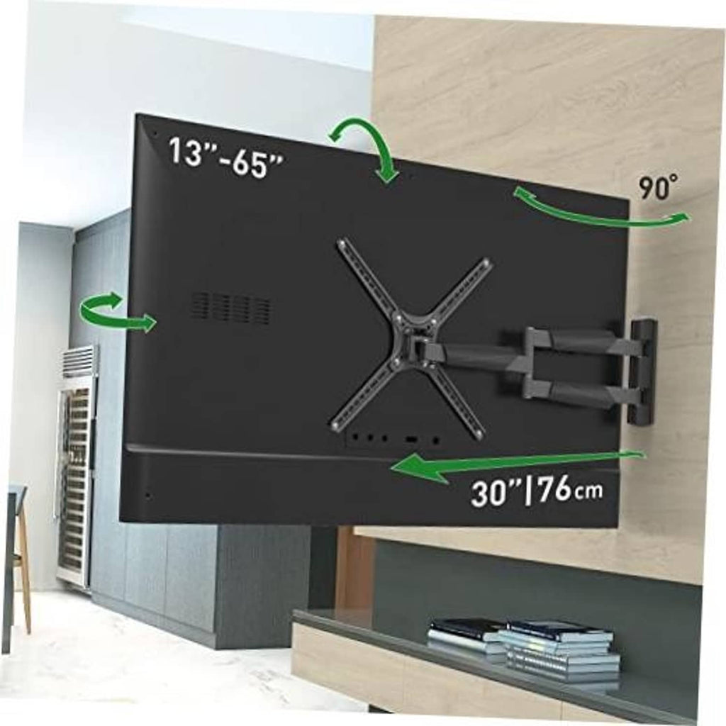 Black full-motion TV wall mount holding a TV on an interior wall