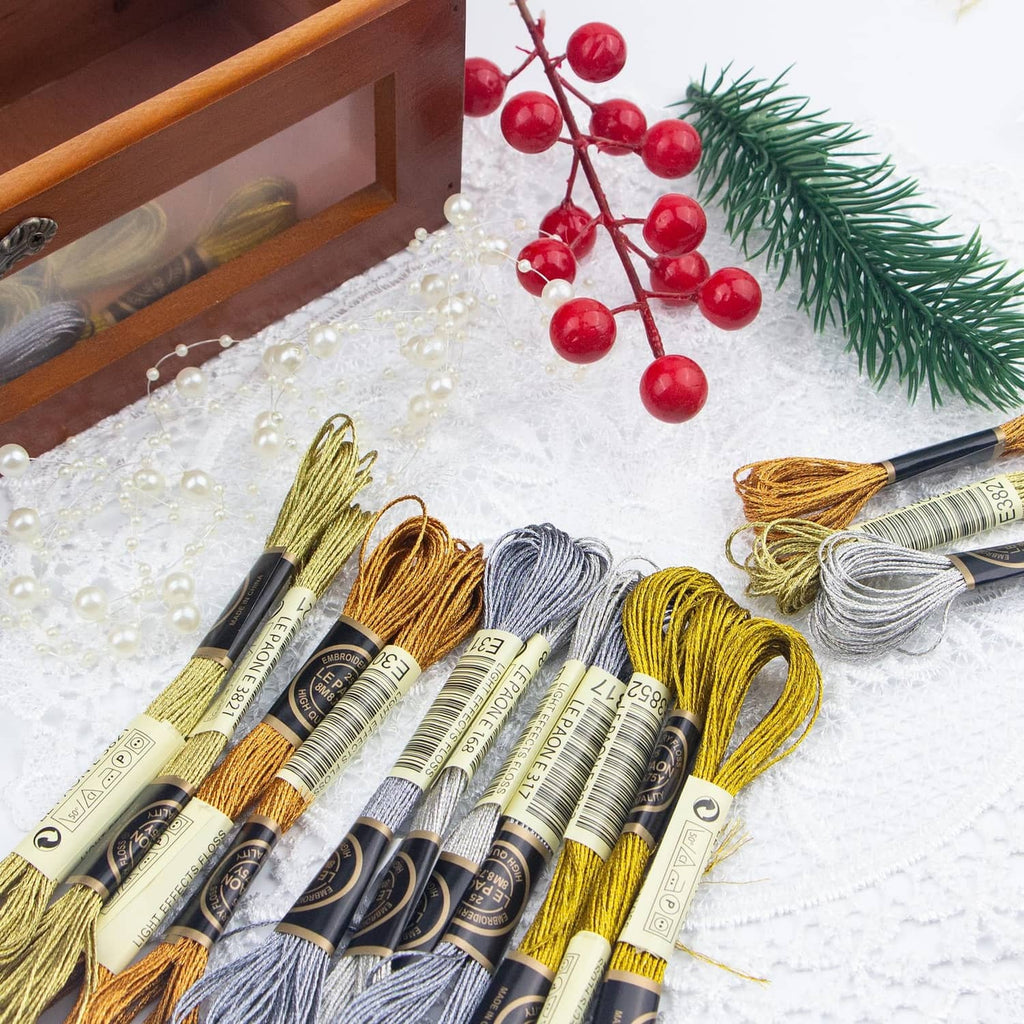 Metallic embroidery thread skeins assortment, including silver