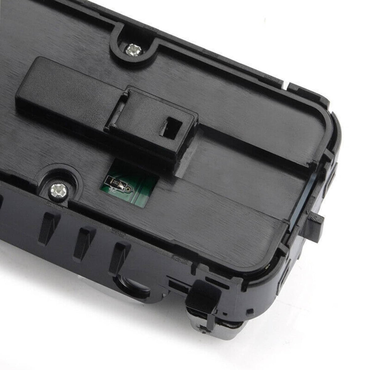 Power window master control switch underside with green circuit board and connector