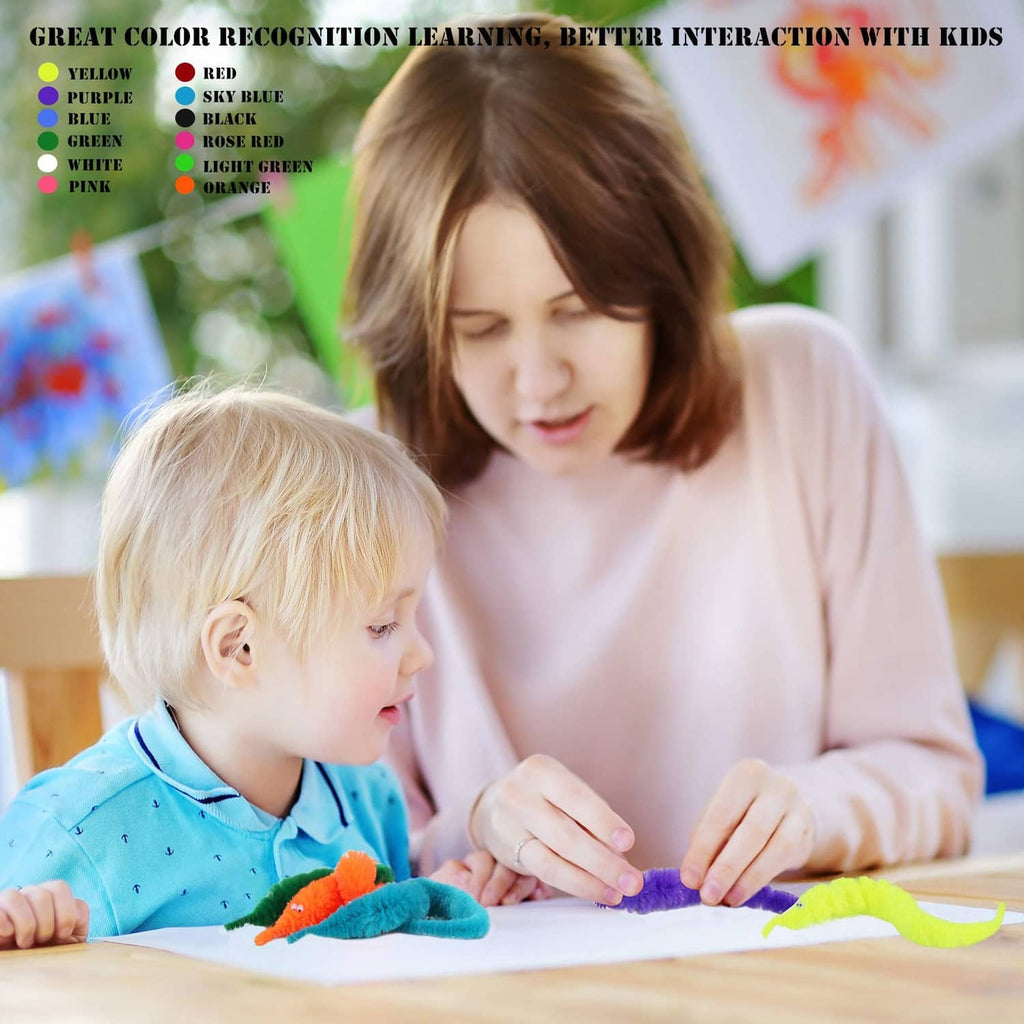 Colorful fuzzy worm toys with invisible strings during kids play on tabletop