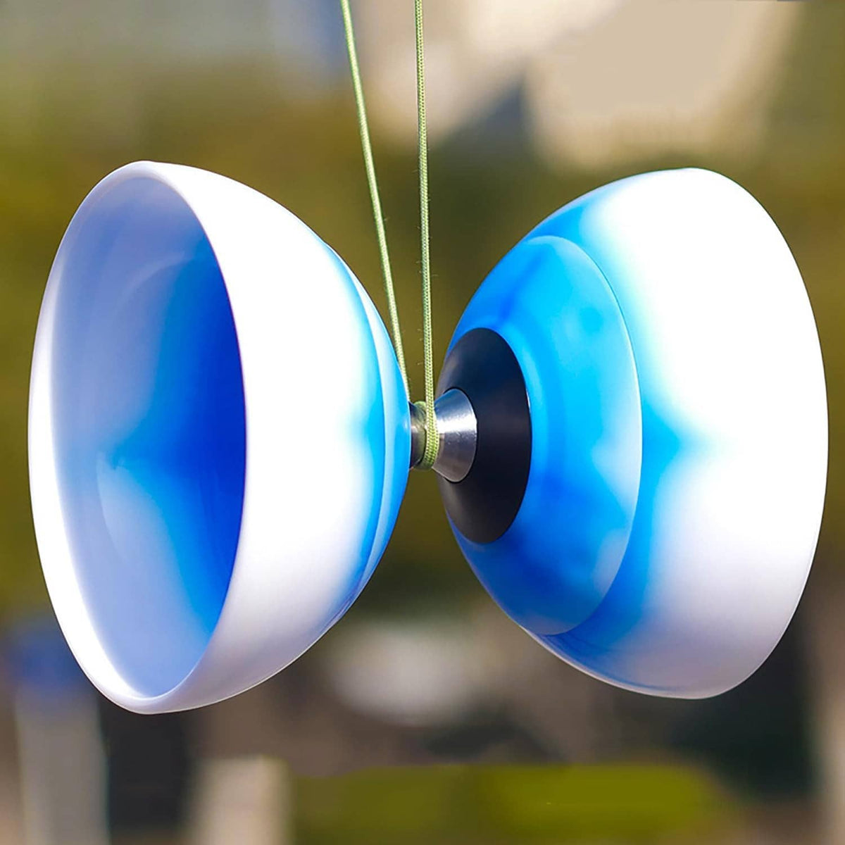 Blue and white diabolo juggling wheel pair with axle and braided string.