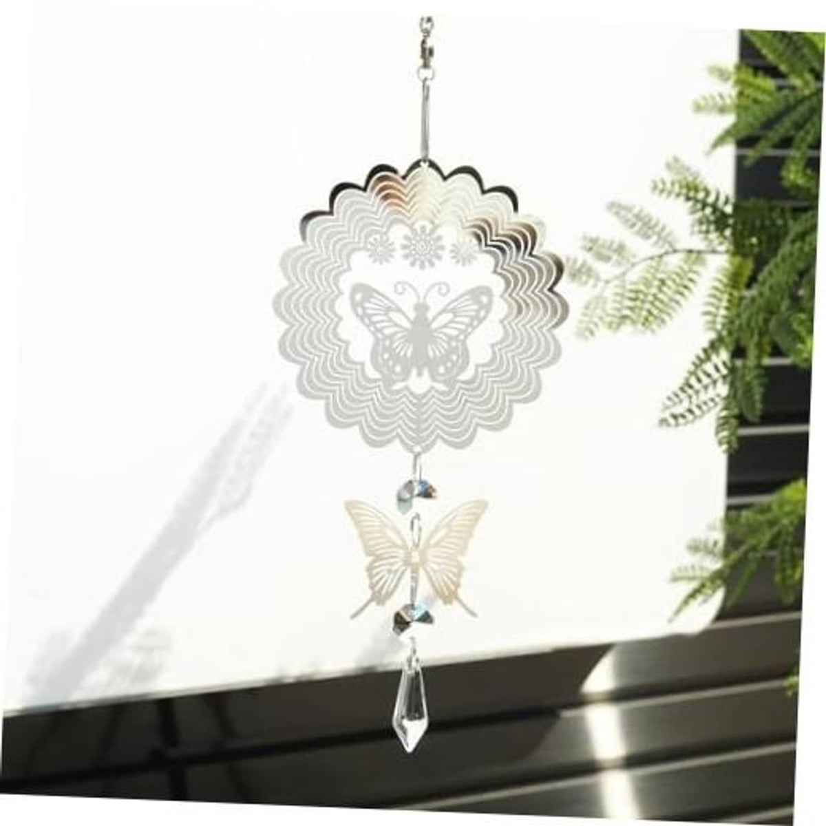 Silver butterfly sun catcher wind spinner with crystal bead accents and hanging charms.