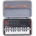 Open hard keyboard case with gray lining and orange cable compartment
