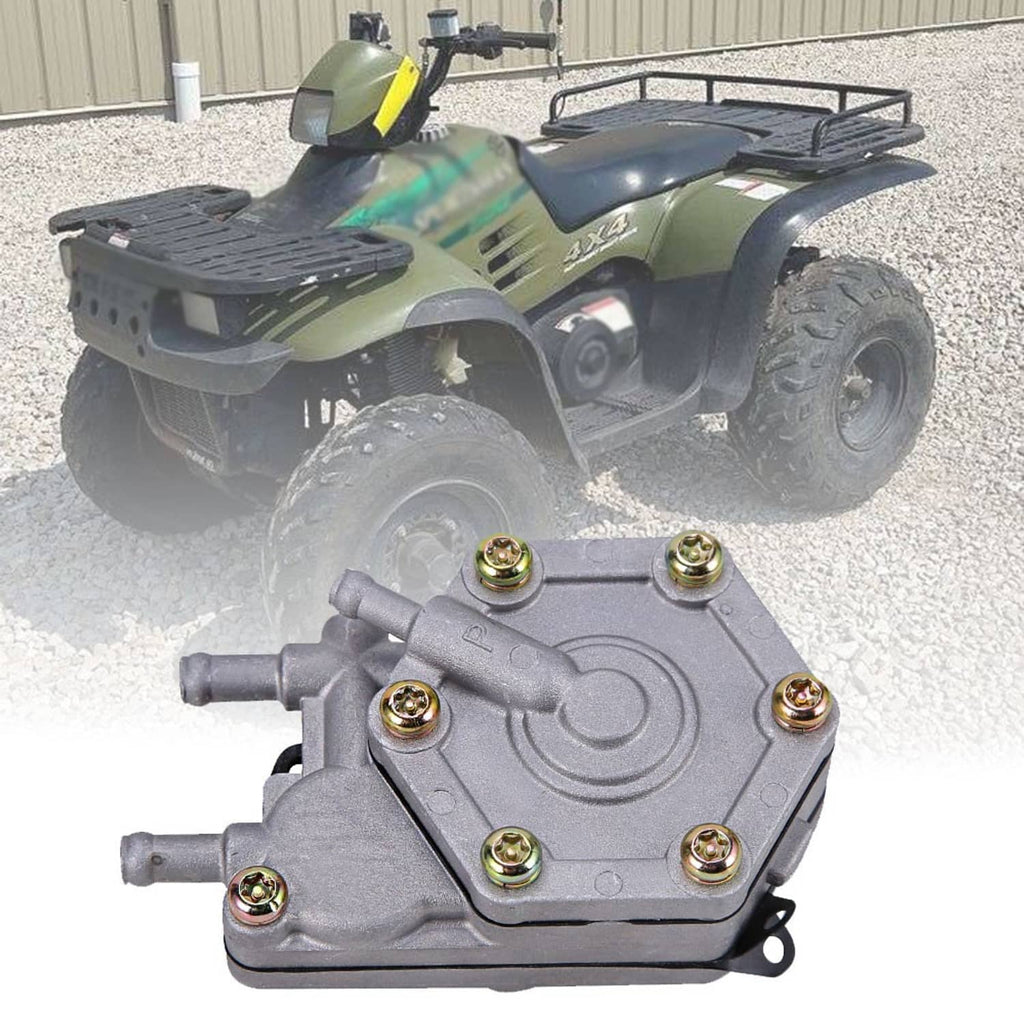 Fuel pump on an ATV: gray metal unit with hose ports and mounted screws