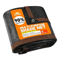 Black shade cloth roll with reinforced edge binding and grommet eyelets