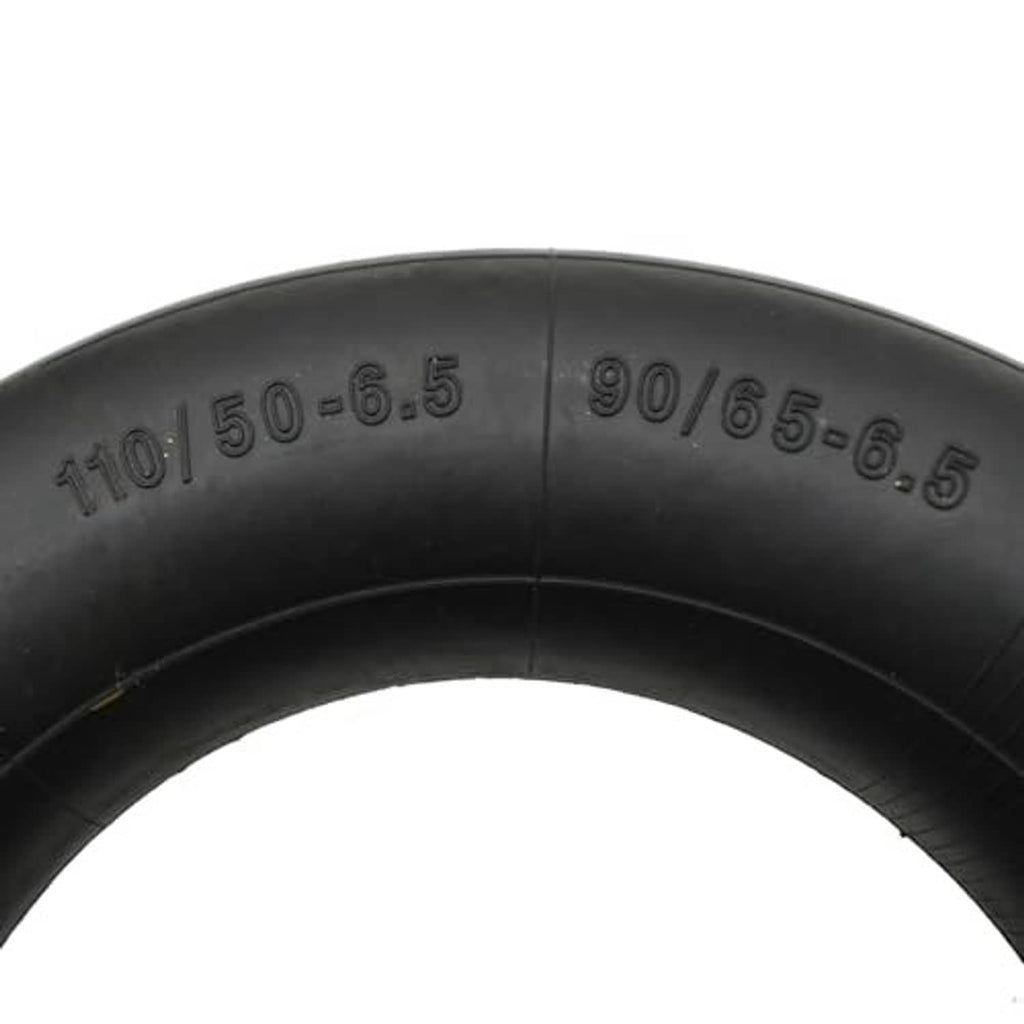 Close-up of black inner tube showing molded size markings 110/50-6.5 and 90/65-6.5.