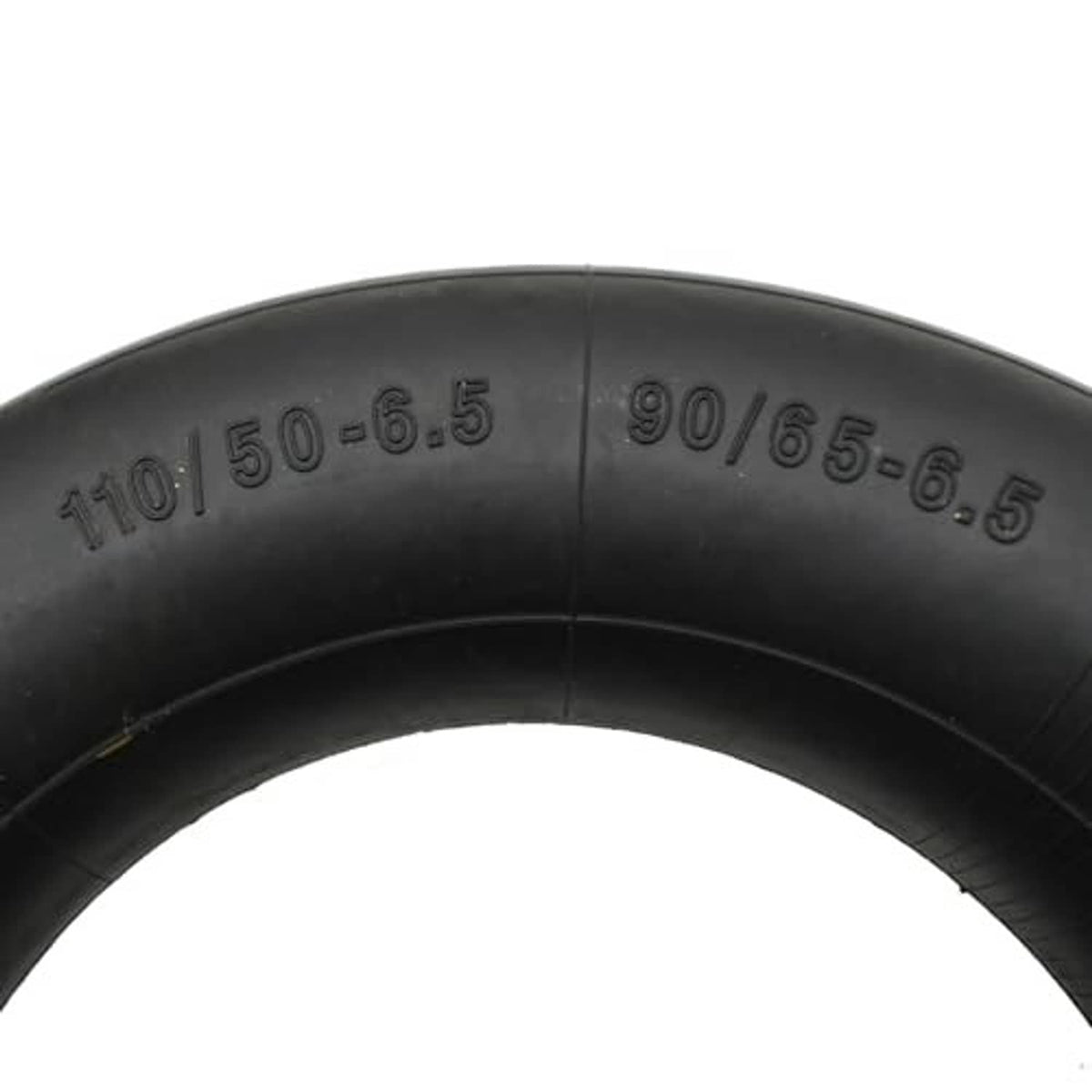 Close-up of black inner tube showing molded size markings 110/50-6.5 and 90/65-6.5.