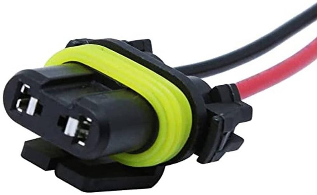 Close-up of LED female pigtail connector with green ring and red/black wires