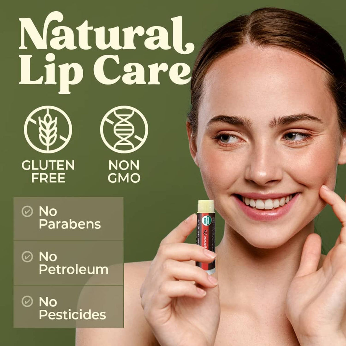 Smiling woman holding an organic lip balm tube near her lips