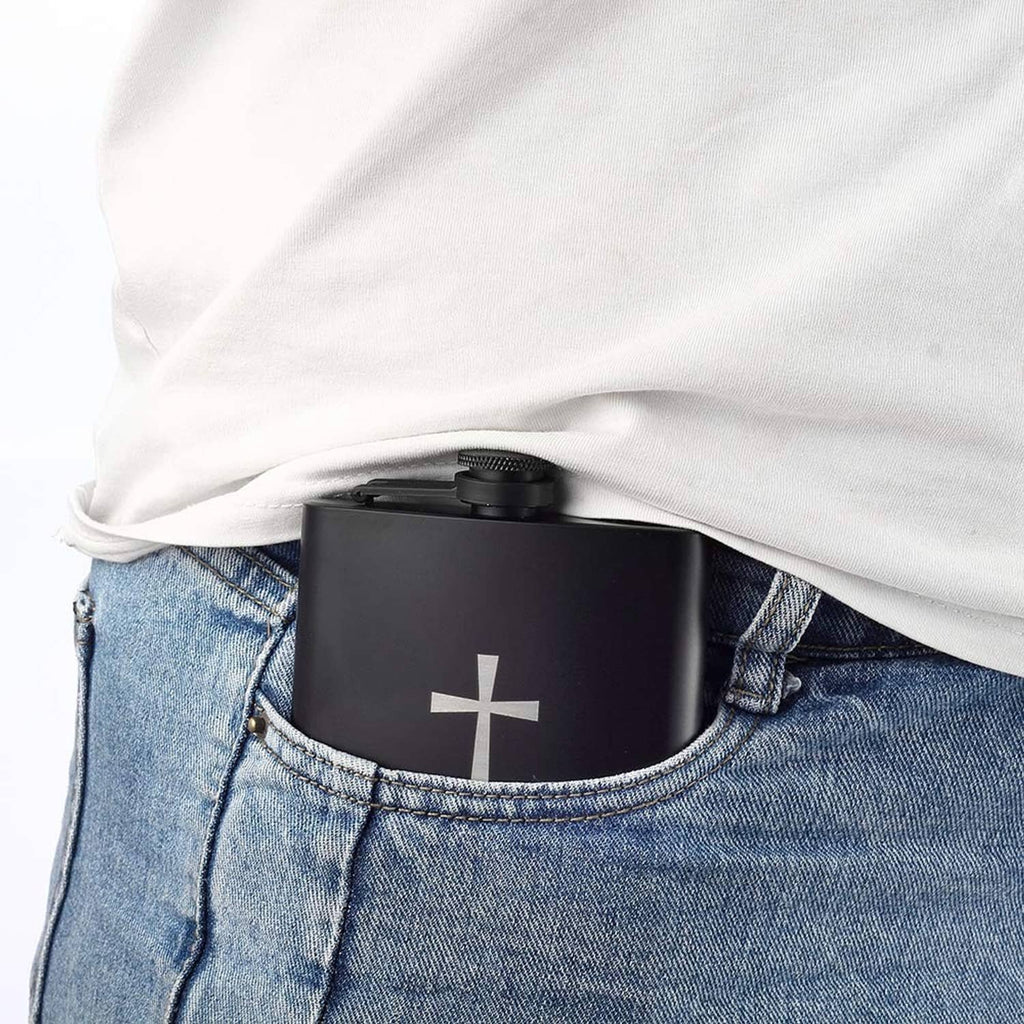 Black hip flask with cross logo tucked in blue denim pocket