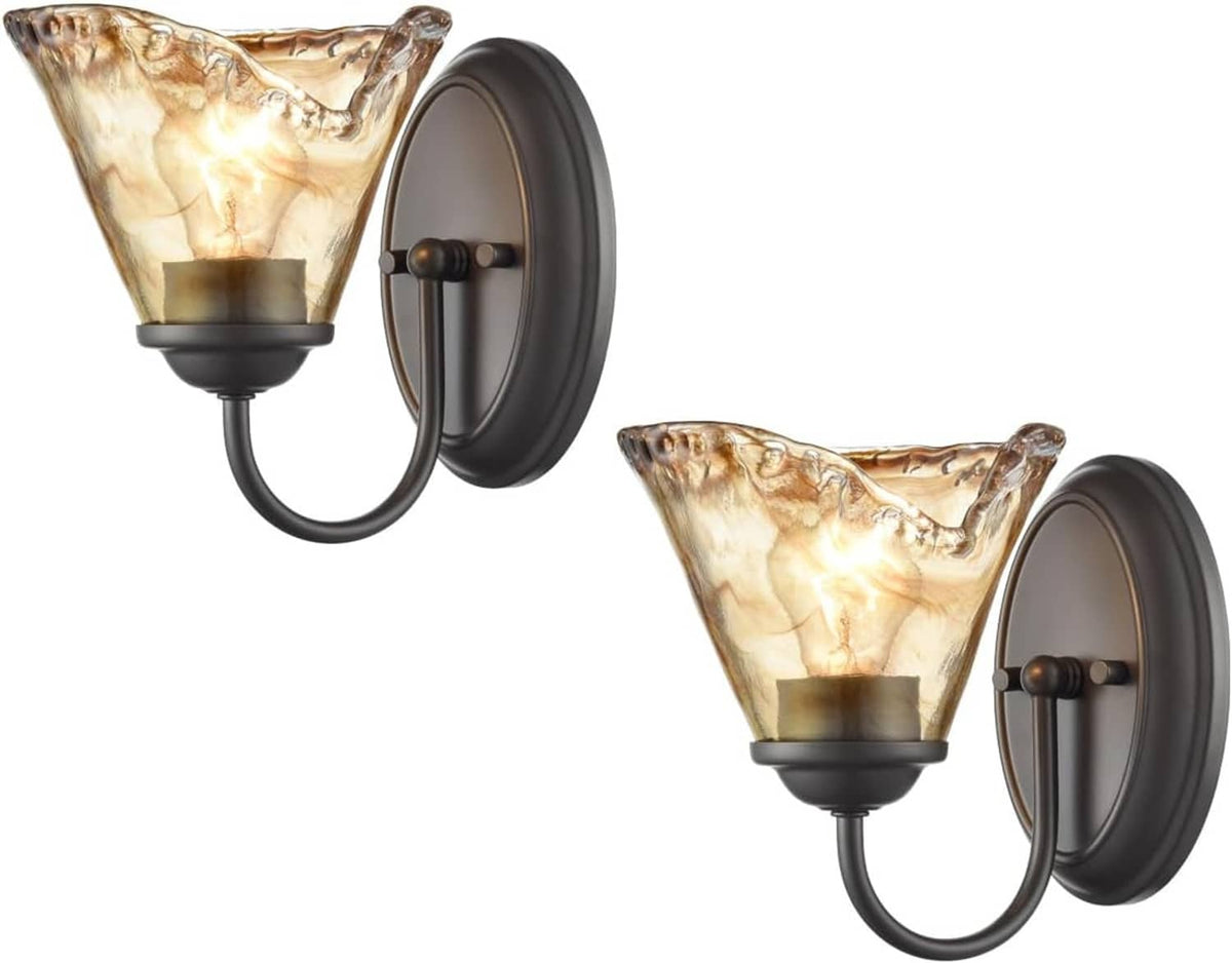 Vintage wall sconce set with amber glass cone shades and dark metal round backplates