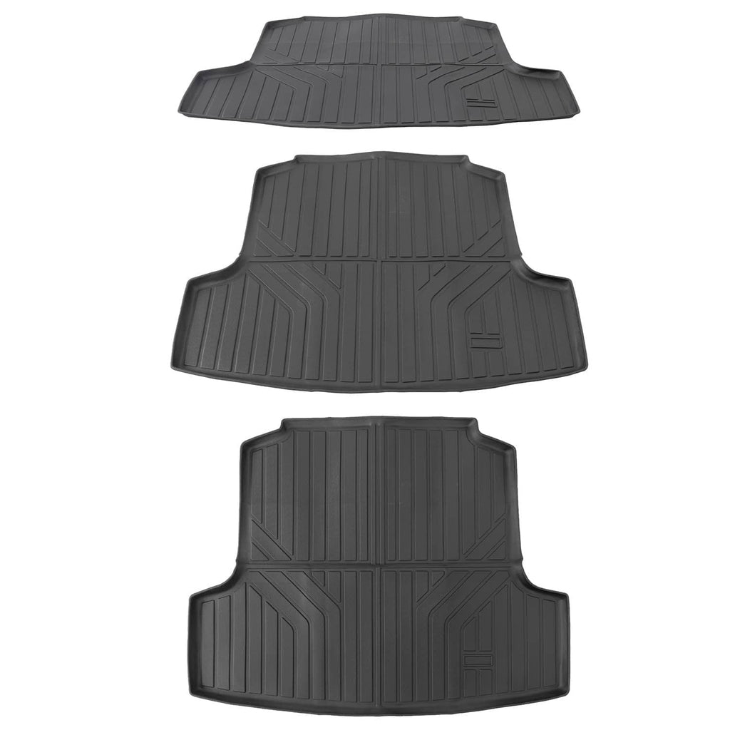 Black cargo liner and floor mat set with molded channels and raised tread